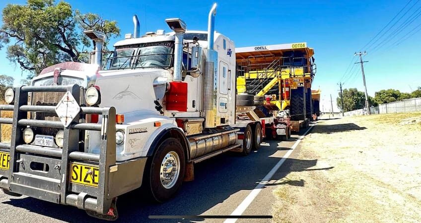 Truck showing how are mining trucks transported